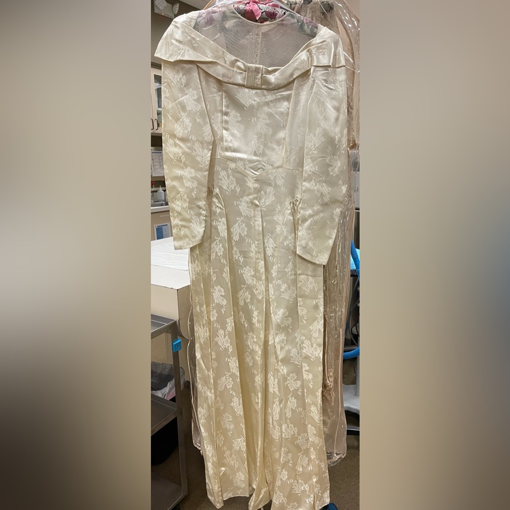 Beautiful Handmade Vintage 1949 wedding dresses with detachable train.